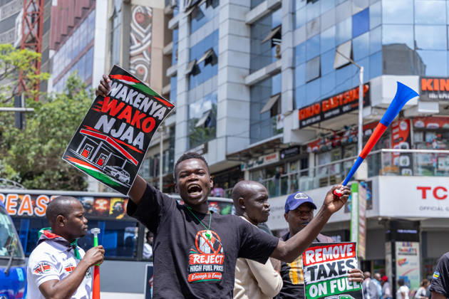October 26, 2026, Nairobi, Kenya: Kenyan human rights activist holds a placard during the protest. Protesters demonstrated against rising fuel prices and the cost of living in Nairobi s Central Business District, calling for lower fuel prices and the removal of fuel taxes. Nairobi Kenya  - ZUMAs197 20261026_aaa_s197_317 Copyright: xBonifacexMuthonix