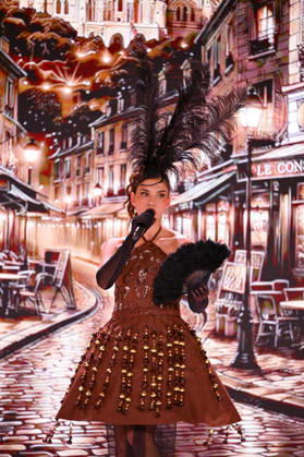 Salon du Chocolat - Paris A model wears a chocolate creation by Christophe Bertrand and Nicolas Morin of La Reine Astrid, designed in collaboration with designer Oriana Sara of Lacienta, during the Chocolate Musical Show at the 31st Salon du Chocolat et de la Pâtisserie – Chocolate Fair at Parc des Expositions Porte de Versailles on October 27, 2026, in Paris, France. Photo by Jana Call me J ABACAPRESS.COM Paris Ile de France France  Copyright: xJanaxCallxmexJ ABACAx