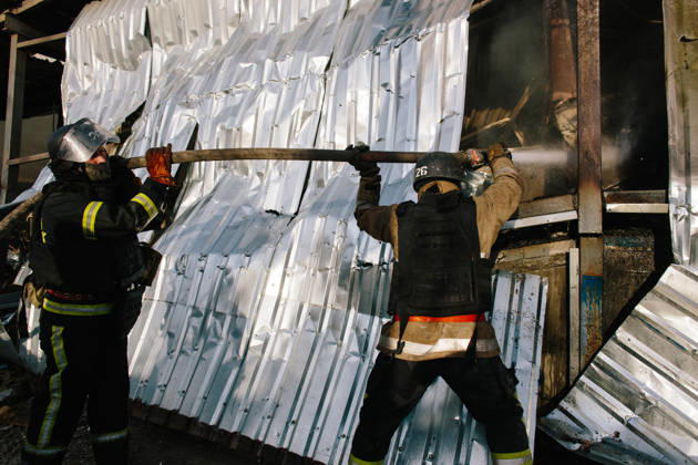 Consequences Of The Attack On Kharkiv Firefighters aim a hose over the wall of a warehouse on fire following a drone strike in Kharkiv, Ukraine, on October 28, 2026. Kharkiv Ukraine  Copyright: xPavloxPakhomenkox originalFilename: pakhomenko-notitle261028_npVhR.jpg