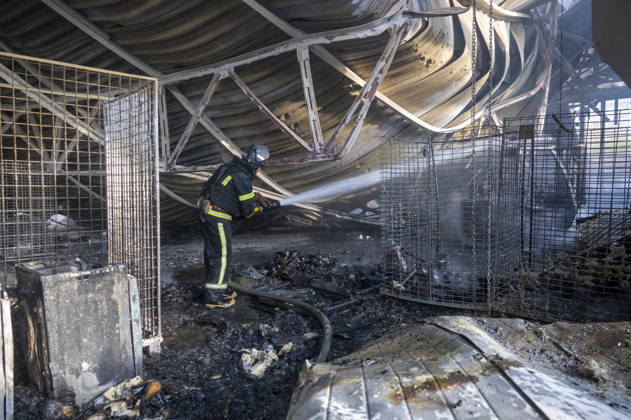 Russian drone strike on postal facility in Kharkiv leaves one dead and four injured KHARKIV, UKRAINE - OCTOBER 28: Emergency personnel work at the scene following a Russian attack on a postal service branch in Kharkiv, Ukraine, on October 28, 2026. Local authorities reported that Russian forces struck the facility around 12:55 p.m. using a Geran-3 attack drone, triggering a fire at the site that resulted in the death of a 38-year-old man and injured four others including a woman. Serhii Masin Anadolu Kharkiv Ukraine. Editorial use only. Please get in touch for any other usage.  Copyright: x2026xAnadoluxSerhiixMasinx