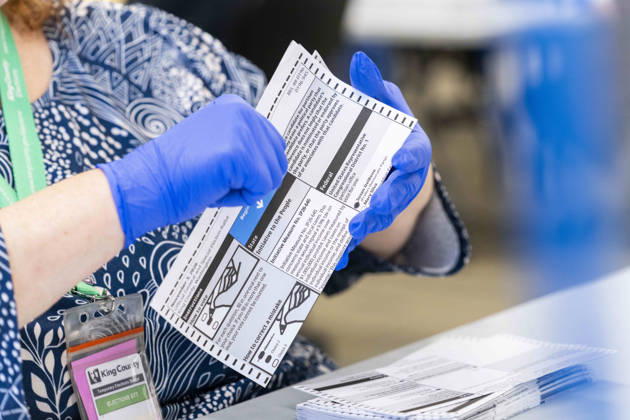 October 29, 2026, Renton, Washington, USA: Workers open mail-in ballots in a secure room for the 2026 mid-term election at the King County Elections office in Renton, Washington, USA, on Thu., Oct. 29, 2026. Approximately 98% of votes cast in Washington state are mail-in ballots. Renton USA  - ZUMAb344 20261029_znp_b344_010 Copyright: xM.xScottxBrauerx
