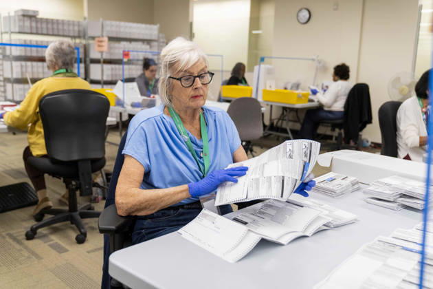 October 29, 2026, Renton, Washington, USA: Workers open mail-in ballots in a secure room for the 2026 mid-term election at the King County Elections office in Renton, Washington, USA, on Thu., Oct. 29, 2026. Approximately 98% of votes cast in Washington state are mail-in ballots. Renton USA  - ZUMAb344 20261029_znp_b344_013 Copyright: xM.xScottxBrauerx