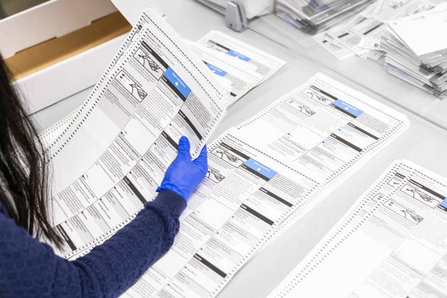 October 29, 2026, Renton, Washington, USA: Workers open mail-in ballots in a secure room for the 2026 mid-term election at the King County Elections office in Renton, Washington, USA, on Thu., Oct. 29, 2026. Approximately 98% of votes cast in Washington state are mail-in ballots. Renton USA  - ZUMAb344 20261029_znp_b344_016 Copyright: xM.xScottxBrauerx