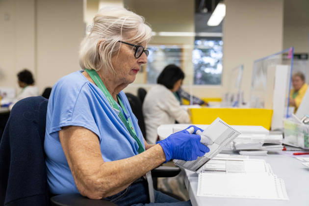 October 29, 2026, Renton, Washington, USA: Workers open mail-in ballots in a secure room for the 2026 mid-term election at the King County Elections office in Renton, Washington, USA, on Thu., Oct. 29, 2026. Approximately 98% of votes cast in Washington state are mail-in ballots. Renton USA  - ZUMAb344 20261029_znp_b344_051 Copyright: xM.xScottxBrauerx