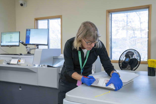 October 29, 2026, Renton, Washington, USA: A worker secures ballots after they have been scanned by a machine in a secure room as 2026 mid-term election ballots are opened and counted at the King County Elections office in Renton, Washington, USA, on Thu., Oct. 29, 2026. By state law, votes cannot be tabulated until after 9pm on election day, so the the ballots are only scanned at this point. Approximately 98% of votes cast in Washington state are mail-in ballots. Renton USA - ZUMAb344 20261029_znp_b344_025 Copyright: xM.xScottxBrauerx