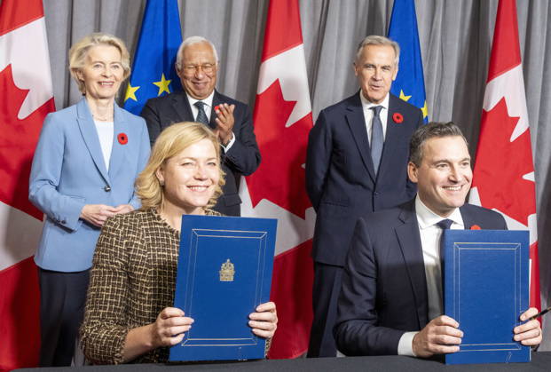 October 30, 2026, Montreal, Pq, CANADA: European Commission President Ursula von der Leyen, rear left to right, European Council President Antonio Costa and Prime Minister Mark Carney look on as Executive Vice-President of the European Commission for Technological Sovereignty, Security, and Democracy, Henna Virkkunen, front left, and Minister of Artificial Intelligence and Digital Innovation Evan Solomon sign the European High-Performance Computing Joint Undertaking (EuroHPC JU) during the EU-Canada summit in Montreal on Friday, Oct. 30, 2026. Montreal CANADA  - ZUMAc35_ 20261030_zaf_c35_059 Copyright: xChristinnexMuschix
