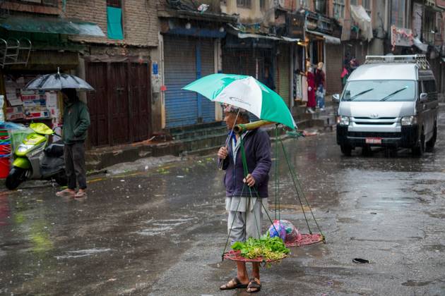 October 31, 2026, Lalitpur, Nepal: LALITPUR, NEPAL OCTOBER 31, 2026: People walk through the rain in Lalitpur as Cyclone Arnab, which originated in the Bay of Bengal, brings rainfall to the Kathmandu Valley. Nepal s National Disaster Risk Reduction and Management Authority (NDRRMA) issued a high-alert advisory for 29 to 31 October, urging people to remain on high alert. Lalitpur Nepal - ZUMAq101 20261031_zna_q101_005 Copyright: xSunilxPradhanx