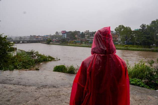 October 31, 2026, Lalitpur, Nepal: LALITPUR, NEPAL OCTOBER 31, 2026: People walk through the rain in Lalitpur as Cyclone Arnab, which originated in the Bay of Bengal, brings rainfall to the Kathmandu Valley. Nepal s National Disaster Risk Reduction and Management Authority (NDRRMA) issued a high-alert advisory for 29 to 31 October, urging people to remain on high alert. Lalitpur Nepal - ZUMAq101 20261031_zna_q101_008 Copyright: xSunilxPradhanx