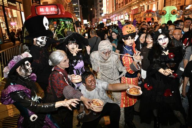 Halloween in Hong Kong Cosplayers posing photo during Halloween day at Mong Kok on October 31, 2026 in Hong Kong. (Photo by Kobe Li Nexpher Images) Hong Kong