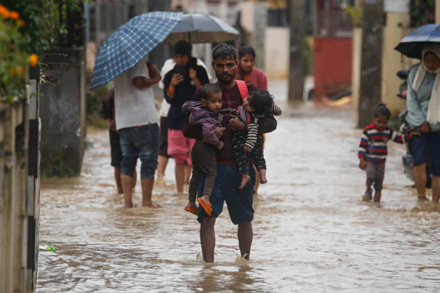 Flooding Disrupts Daily Life In Lalitpur Amid Heavy Rainfall Pedestrians wade through flooded streets amid continuous rainfall caused by Cyclone Arnab in Lalitpur, Nepal, on October 31, 2026. Heavy rainfall has inundated several areas, disrupting daily activities and making movement difficult for pedestrians and motorists. Lalitpur Nepal  Copyright: xSanjitxPariyarx originalFilename: pariyar-notitle261031_npg6y.jpg