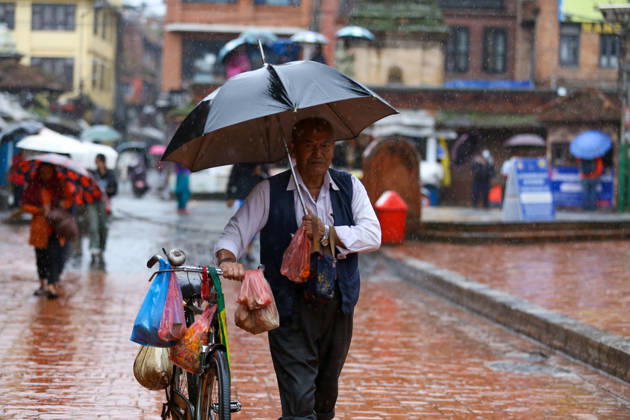 Cyclone Arnab s Impact: Continuous Rainfall Disrupts Daily Life Across Kathmandu Valley A pedestrian walks through Patan carrying an umbrella during rainfall in Lalitpur, Nepal, on October 31, 2026. Continuous rain has disrupted daily activities across the Kathmandu Valley. Lalitpur Bagmati Nepal  Copyright: xSubaasxShresthax originalFilename: shrestha-cyclonea261031_npM3b.jpg
