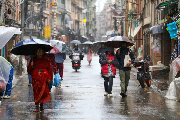 Cyclone Arnab s Impact: Continuous Rainfall Disrupts Daily Life Across Kathmandu Valley People walk through Patan with umbrellas during continuous rainfall in Lalitpur, Nepal, on October 31, 2026. The persistent rain has affected pedestrian movement and daily activities in the Kathmandu Valley. Lalitpur Bagmati Nepal  Copyright: xSubaasxShresthax originalFilename: shrestha-cyclonea261031_npQSd.jpg