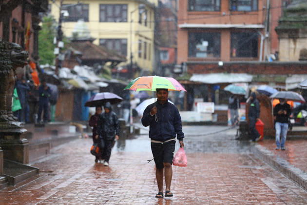 Cyclone Arnab s Impact: Continuous Rainfall Disrupts Daily Life Across Kathmandu Valley A pedestrian walks through Patan carrying an umbrella during rainfall in Lalitpur, Nepal, on October 31, 2026. Continuous rain has disrupted daily activities across the Kathmandu Valley. Lalitpur Bagmati Nepal  Copyright: xSubaasxShresthax originalFilename: shrestha-cyclonea261031_npAf4.jpg