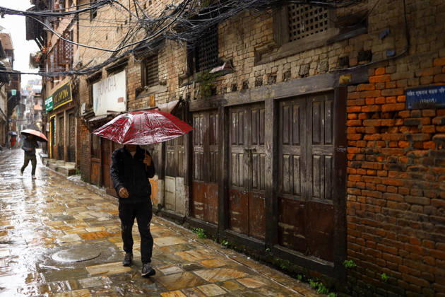 Cyclone Arnab s Impact: Continuous Rainfall Disrupts Daily Life Across Kathmandu Valley A pedestrian walks through Patan carrying an umbrella during rainfall in Lalitpur, Nepal, on October 31, 2026. Continuous rain has disrupted daily activities across the Kathmandu Valley. Lalitpur Bagmati Nepal  Copyright: xSubaasxShresthax originalFilename: shrestha-cyclonea261031_npJ7C.jpg