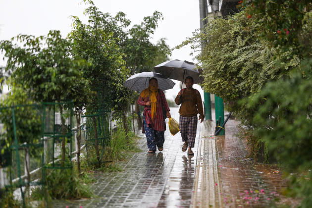 Cyclone Arnab s Impact: Continuous Rainfall Disrupts Daily Life Across Kathmandu Valley Pedestrians walk along a street carrying umbrellas during continuous rainfall in Patan, Lalitpur, Nepal, on October 31, 2026. Daily activities in the Kathmandu Valley have been disrupted by persistent rain triggered by Cyclone Arnab in the Bay of Bengal. Lalitpur Bagmati Nepal  Copyright: xSubaasxShresthax originalFilename: shrestha-cyclonea261031_npyDN.jpg