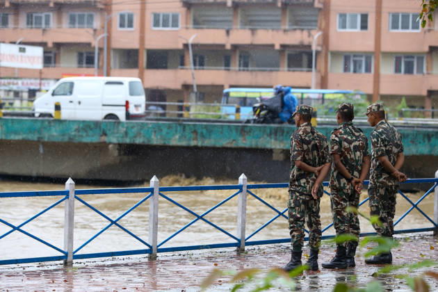 Cyclone Arnab s Impact: Continuous Rainfall Disrupts Daily Life Across Kathmandu Valley Security personnel observe the swollen Manohara River amid continuous rainfall in Chyasal, Lalitpur, Nepal, on October 31, 2026. The Armed Police Force Nepal s No. 21 Battalion has been kept on standby with necessary preparations for possible rescue operations as the river s water level rises. Lalitpur Bagmati Nepal  Copyright: xSubaasxShresthax originalFilename: shrestha-cyclonea261031_npf0j.jpg