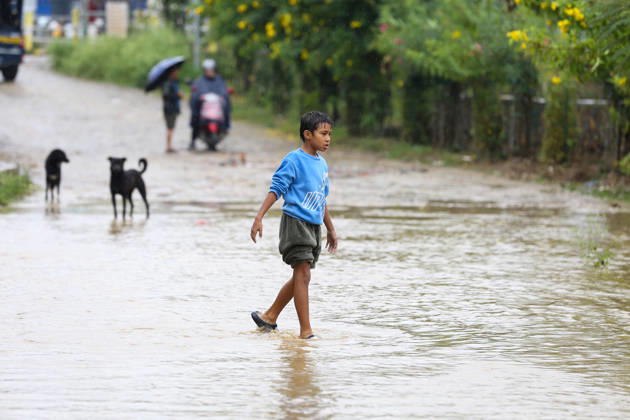Cyclone Arnab s Impact: Continuous Rainfall Disrupts Daily Life Across Kathmandu Valley People walk through floodwater in a residential area in Imadol, Lalitpur, Nepal, on October 31, 2026, after the Karmanasa River overflowed. The flooding has affected daily activities and made movement difficult for local residents. Lalitpur Bagmati Nepal  Copyright: xSubaasxShresthax originalFilename: shrestha-cyclonea261031_npXei.jpg